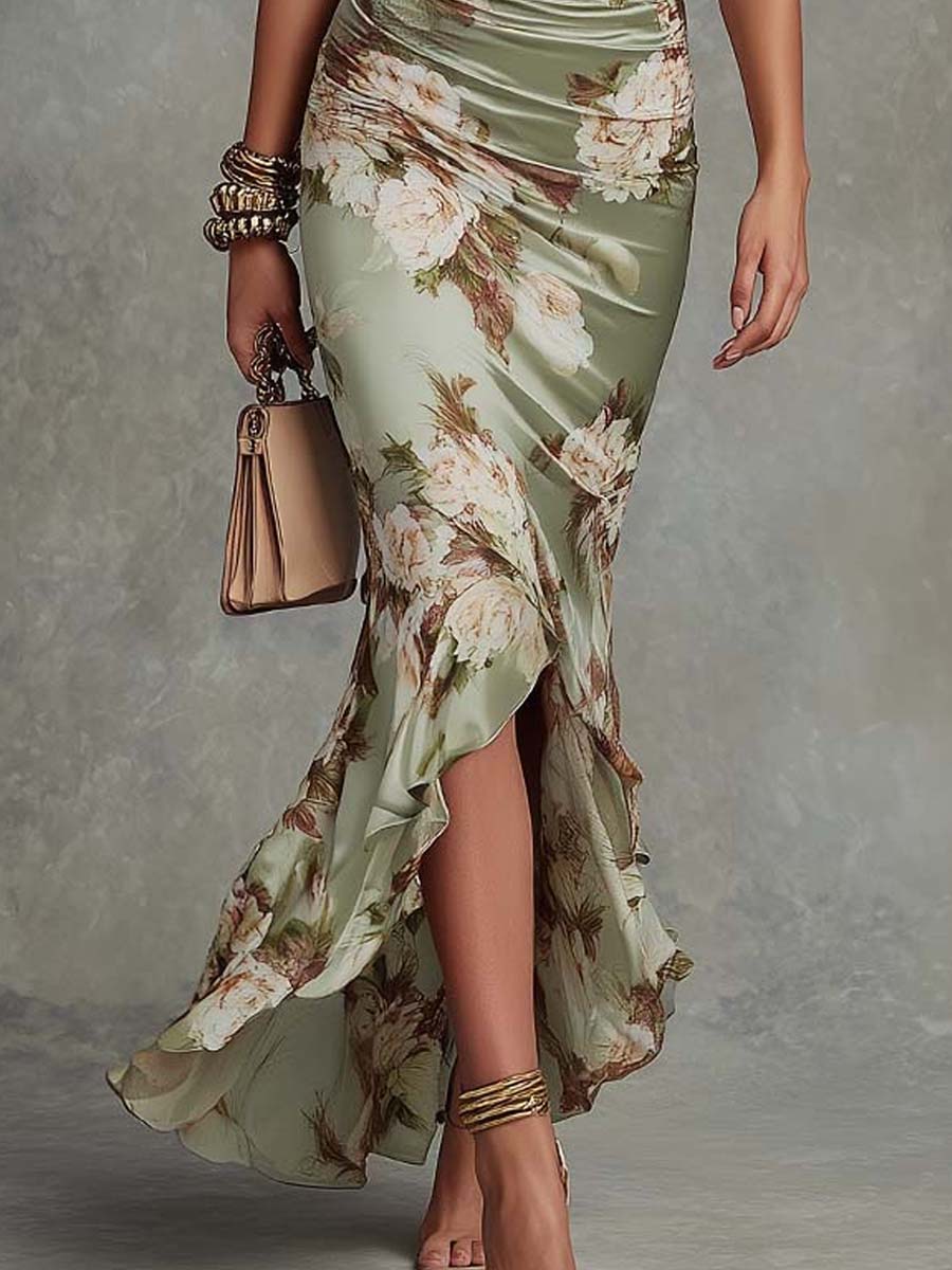 Ana | Vestido asimétrico de satén verde con escote en V, mangas abullonadas y estampado floral.