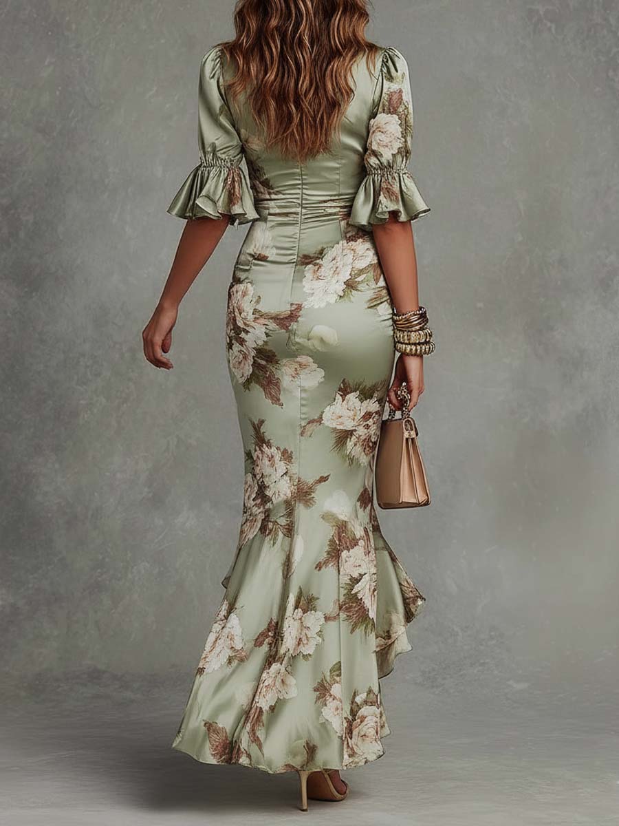 Ana | Vestido asimétrico de satén verde con escote en V, mangas abullonadas y estampado floral.