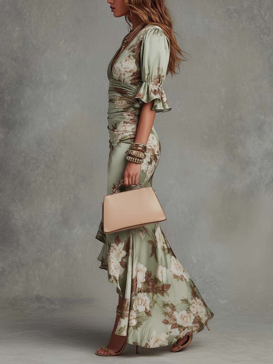 Ana | Vestido asimétrico de satén verde con escote en V, mangas abullonadas y estampado floral.